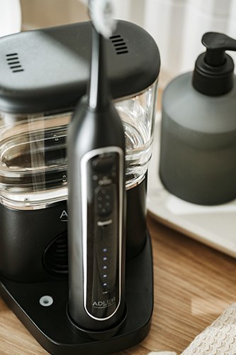 AD 2180 black Szczoteczka soniczna z irygatorem 2 w 1